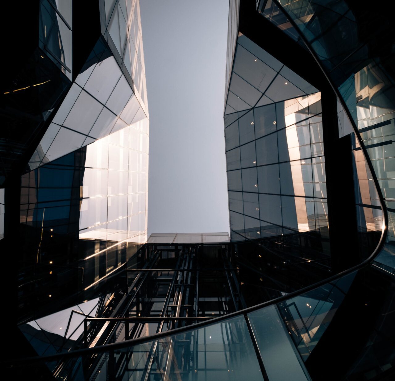 low-angle-shot-of-a-geometrical-design-of-a-building-e1695971044315.jpg